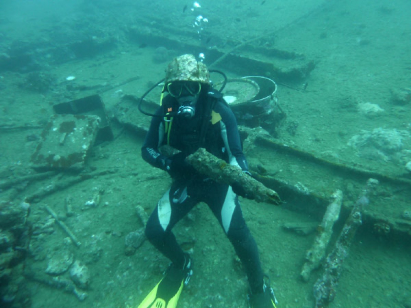 Diver deep inside the Coolidge wreck